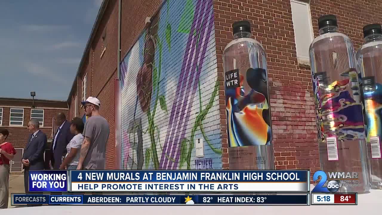 Four murals at Benjamin Franklin High School