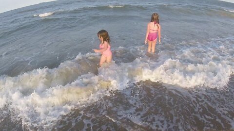Girls playing on the beach