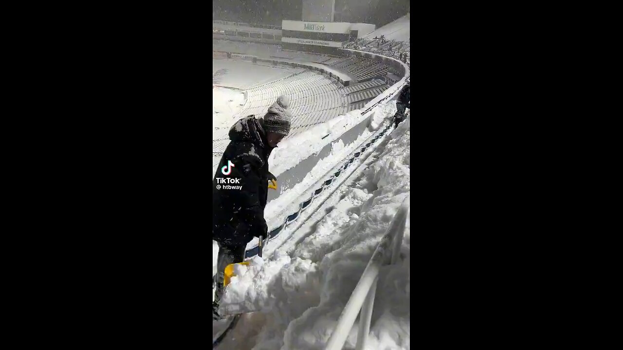 Bills fans working around the clock shoveling.
