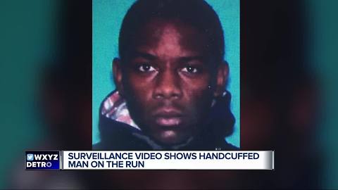 Surveillance video shows handcuffed man on the run
