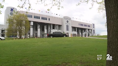 Maryland governor tours mass vax site at Navy Stadium