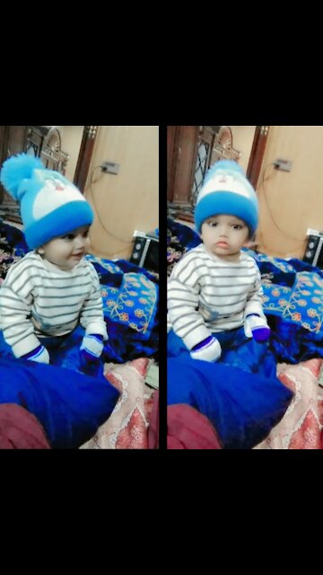 World Cutest baby boy smiling instantly become serious for cam picture .