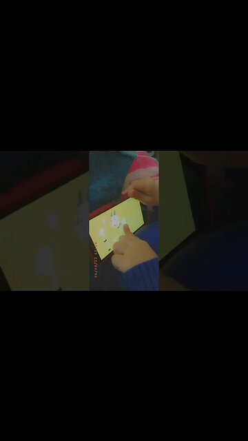 Baby boy learns how to play with his IPAD- Drawing a baby goat