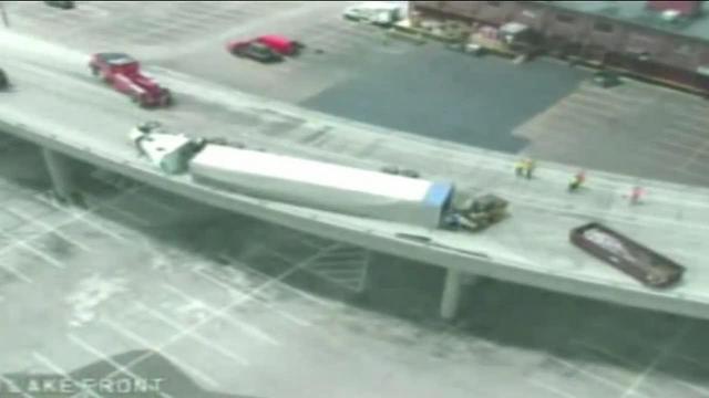 Semi rollover causes traffic headaches in Lake Interchange