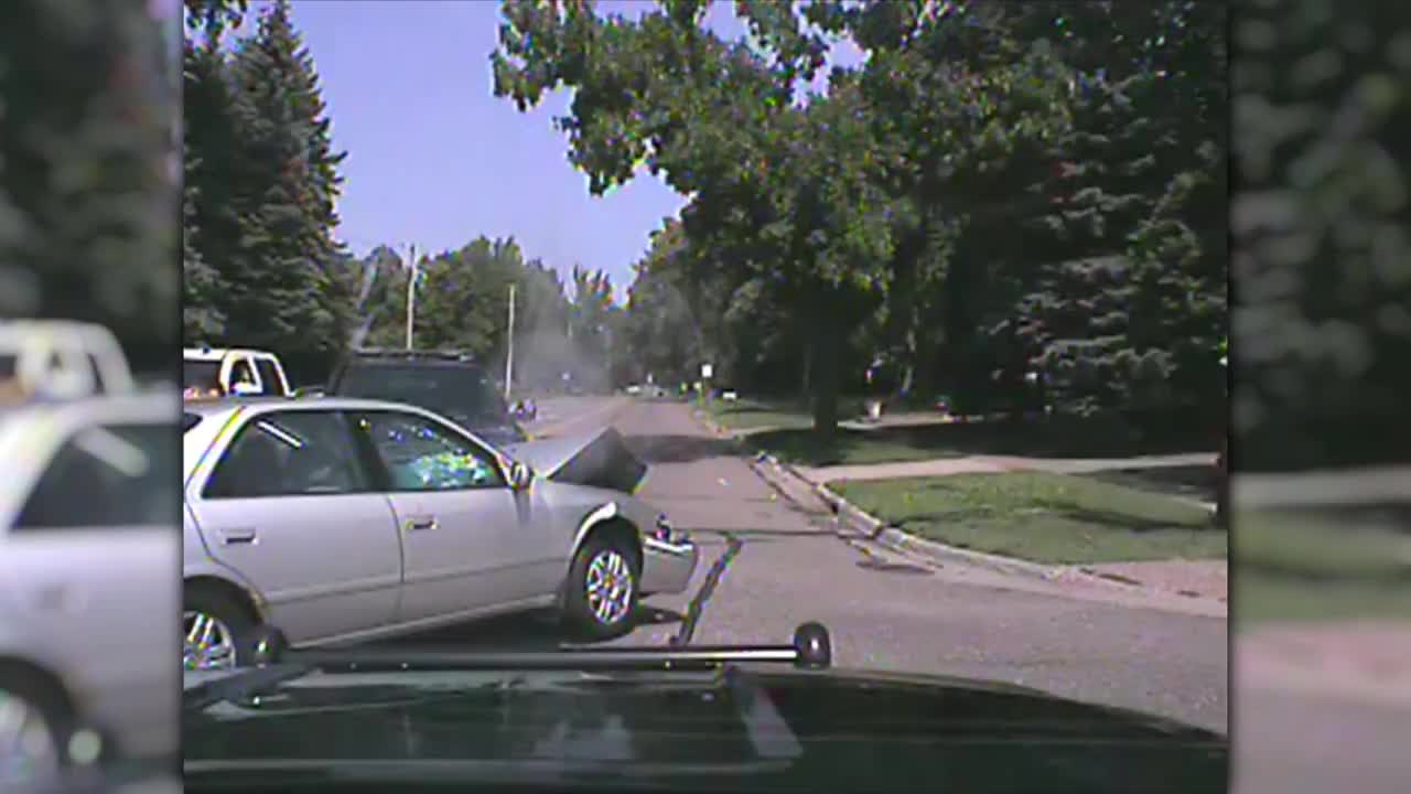 Police car gets hit by distracted driver