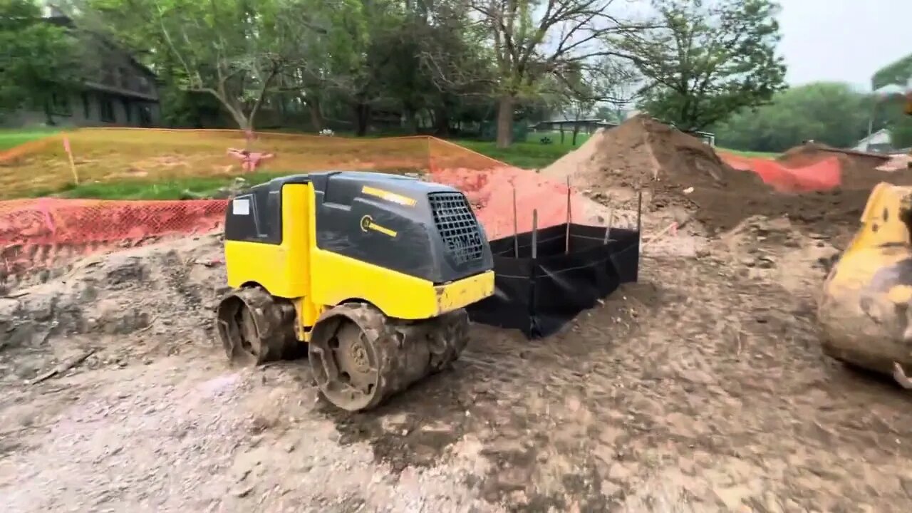 Storm Sewer Inlets are In. Piles of Stuff Every Where. Road Construction Project.
