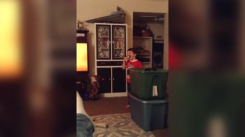 Boy Falls Against A Plastic Tub