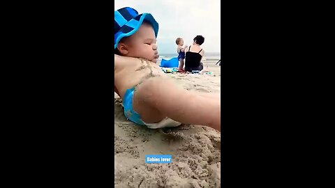 Baby at the beach funny