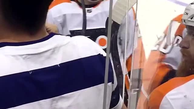 Obnoxious Hockey Fan Is Water Splashed For Misbehaving