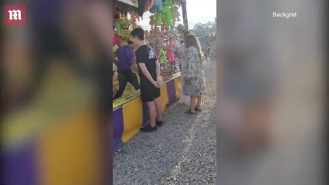 Video: Ben Affleck and Jennifer Lopez play carnival games in Malibu