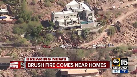 Brush fire near homes on Camelback Mountain