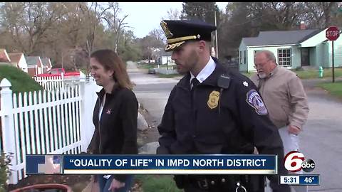 Police officers meet with residents to help them address quality of life issues