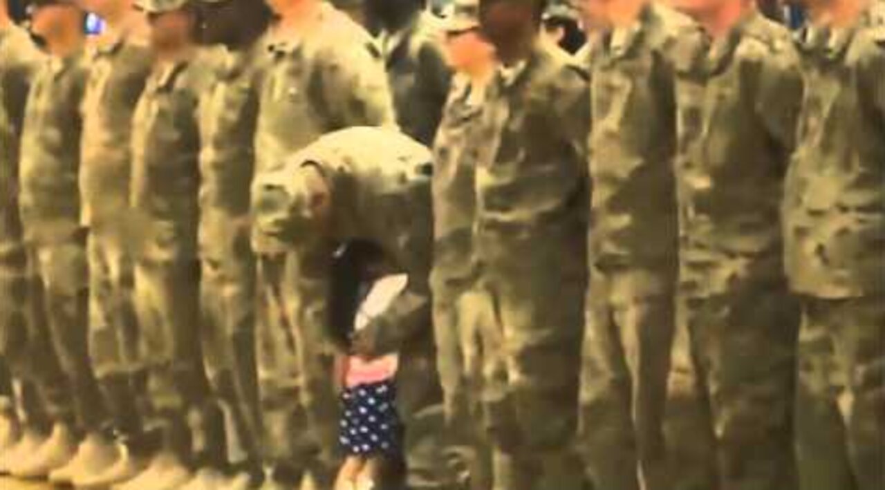 Girl recognized the father among soldiers and breaks military protocol.