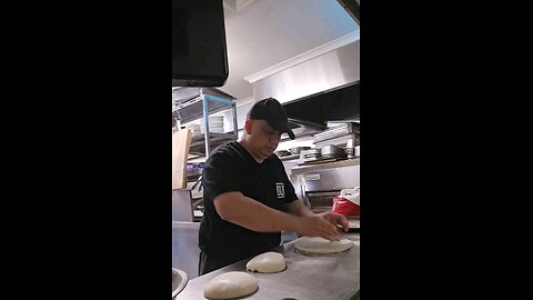 Stretching Hand tossed Dough part 2