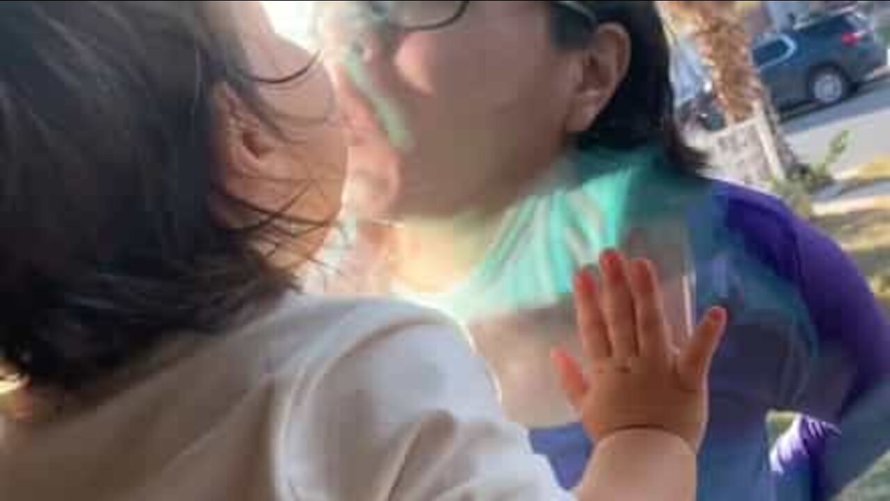 Aunt forced to visit niece behind glass