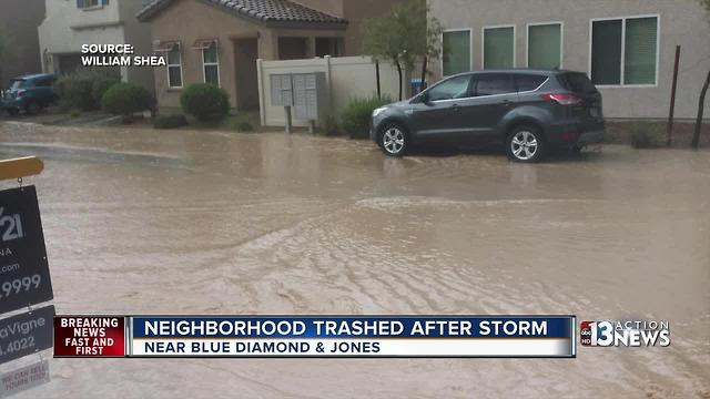 Neighbors blame design for road flooding