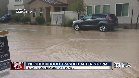 Neighbors blame design for road flooding