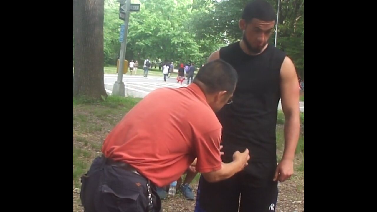 Luodong Checks Chi Of Man In Black Shirt At The Park With The Boys