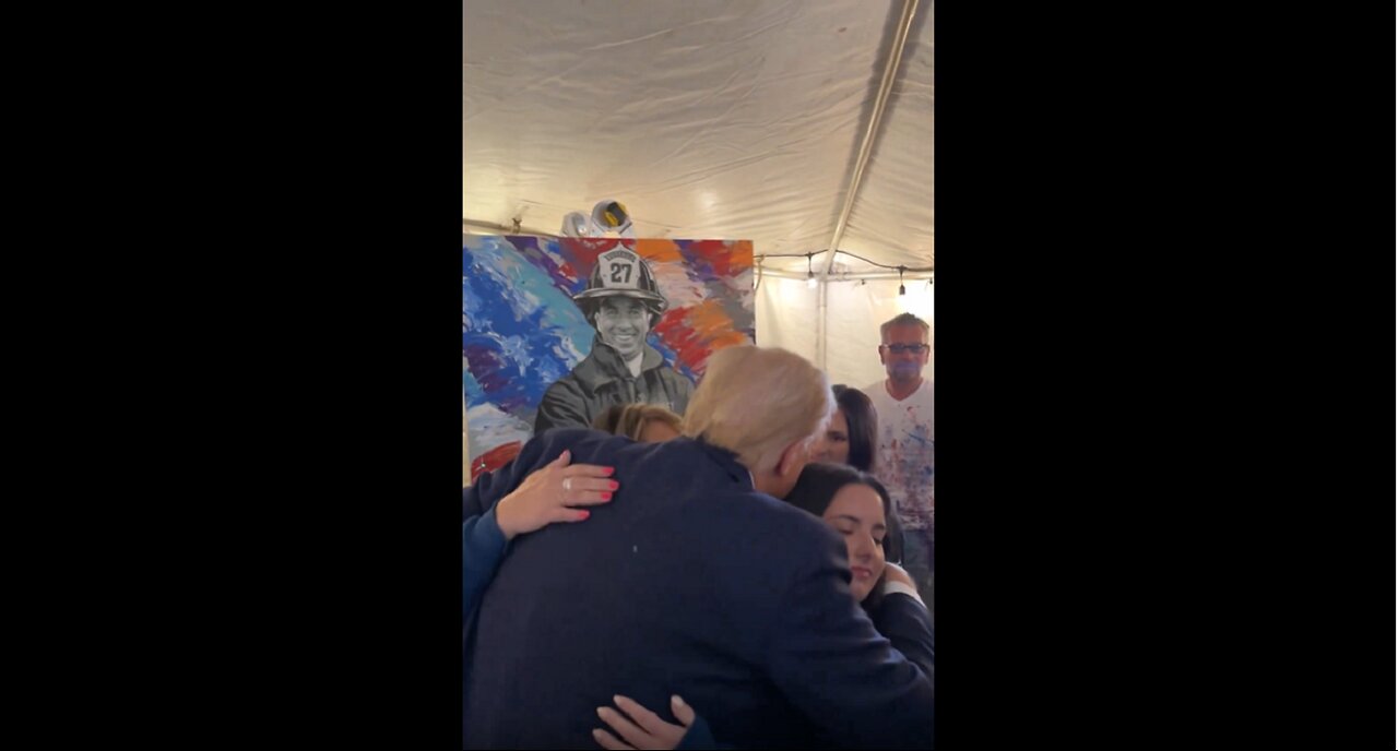 Trump hugging Corey Comperatores family after the Butler rally