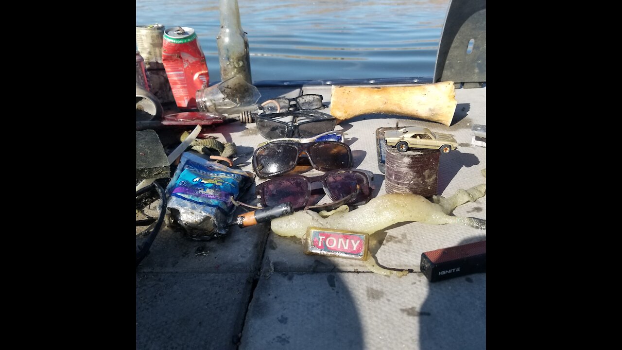 Found sunglasses, old cell phone, lake treasures