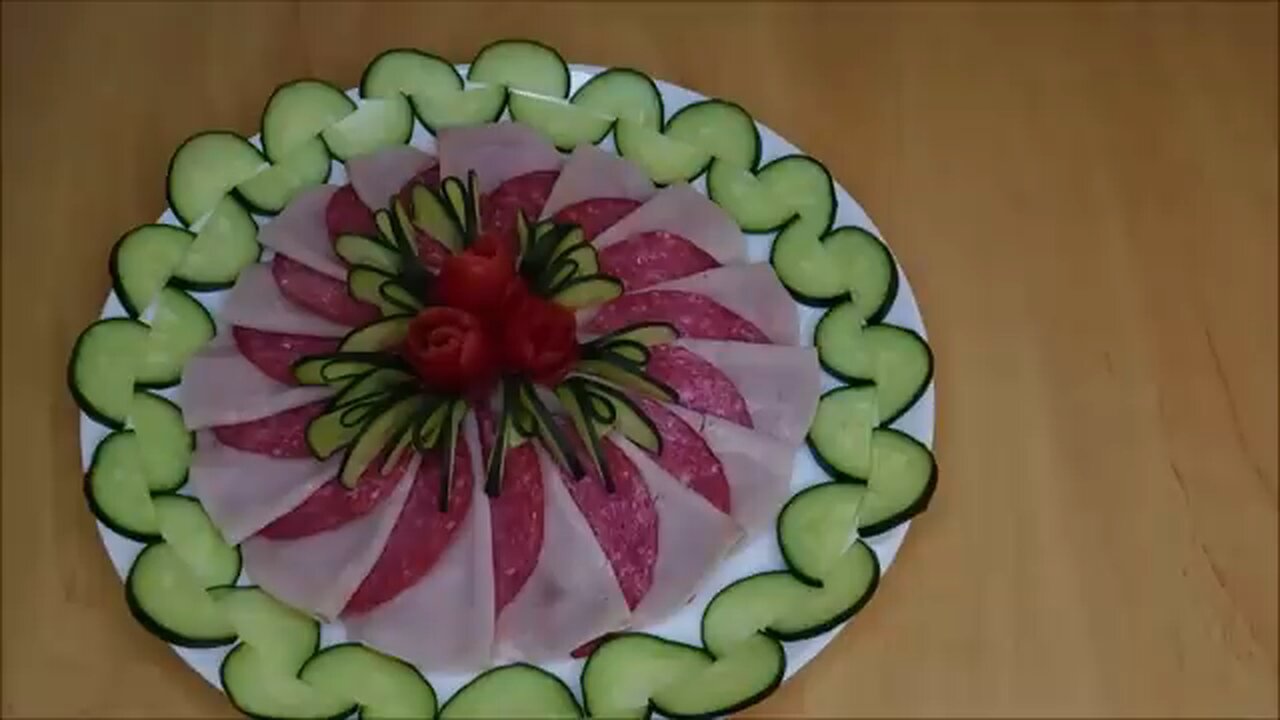 Very pretty, covered plate or covered bowl with cucumber, tomato