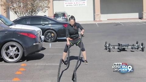 Ignite Fitness donating to Youth On Their Own as part of grand reopening