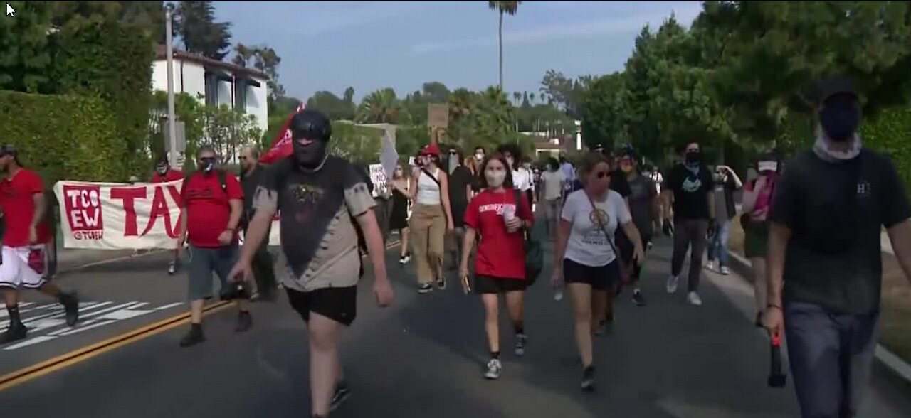 Protestors march on Jeff Bezos mansion