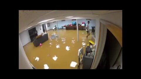 flood waters breeching a basement wall during the storm last week in New Jersey.