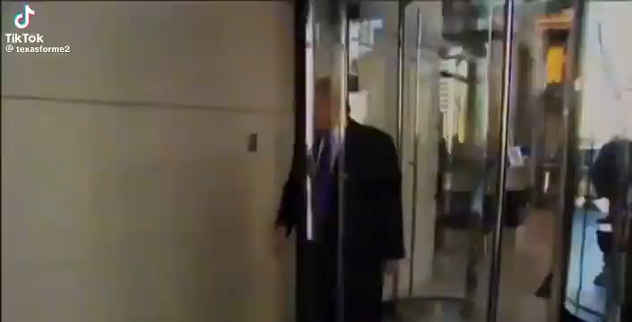 President Trump switches places with his doorman