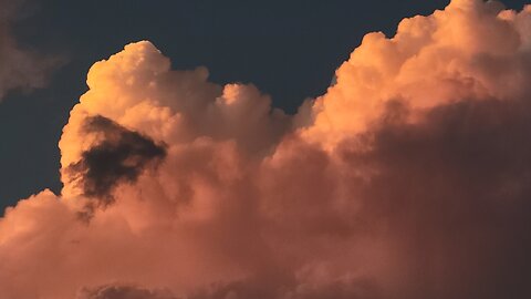 LOOKING FOR LIGHTNING IN THE SUNSET CLOUDS