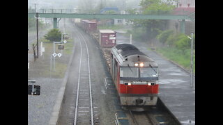 Freight passing in light fog