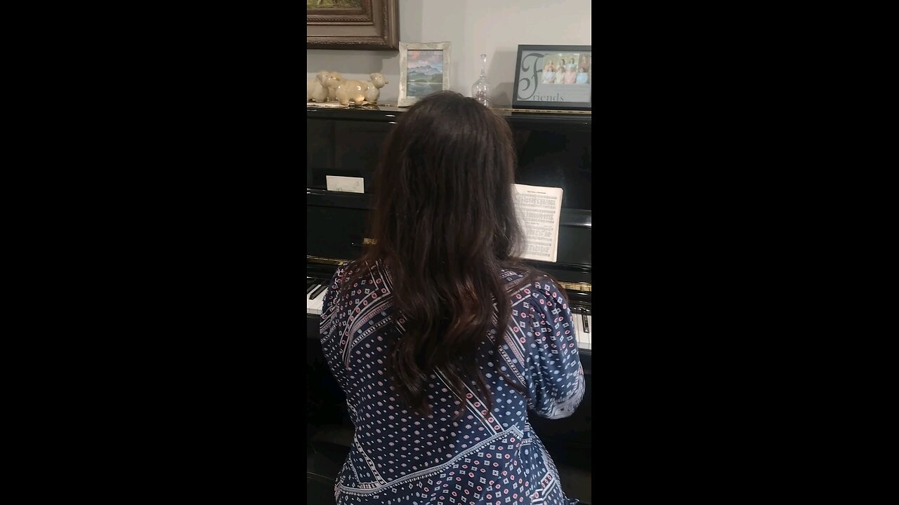 Rebekah playing the piano