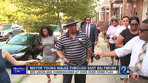 Mayor Young walks through East Baltimore