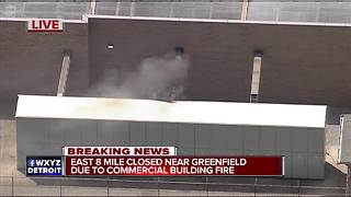 East 8 Mile closed near Greenfield due to commercial building fire