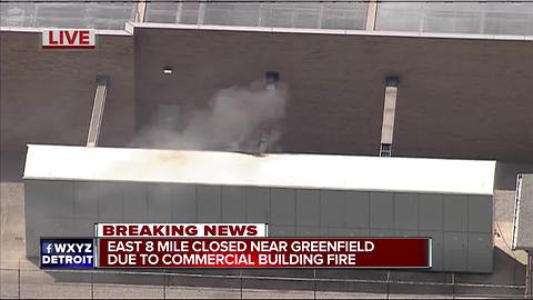 East 8 Mile closed near Greenfield due to commercial building fire