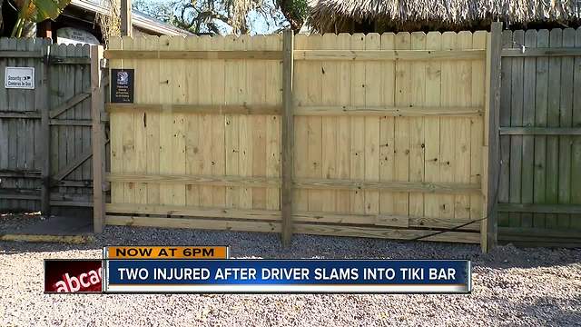 Two injured after driver slams into tiki bar