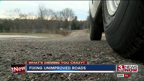 Residents question cost increase to fix unimproved road
