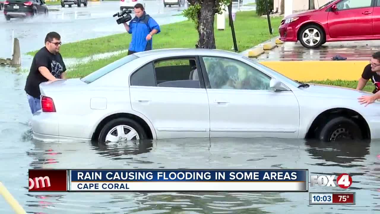 Heavy rain leaves cars flooded