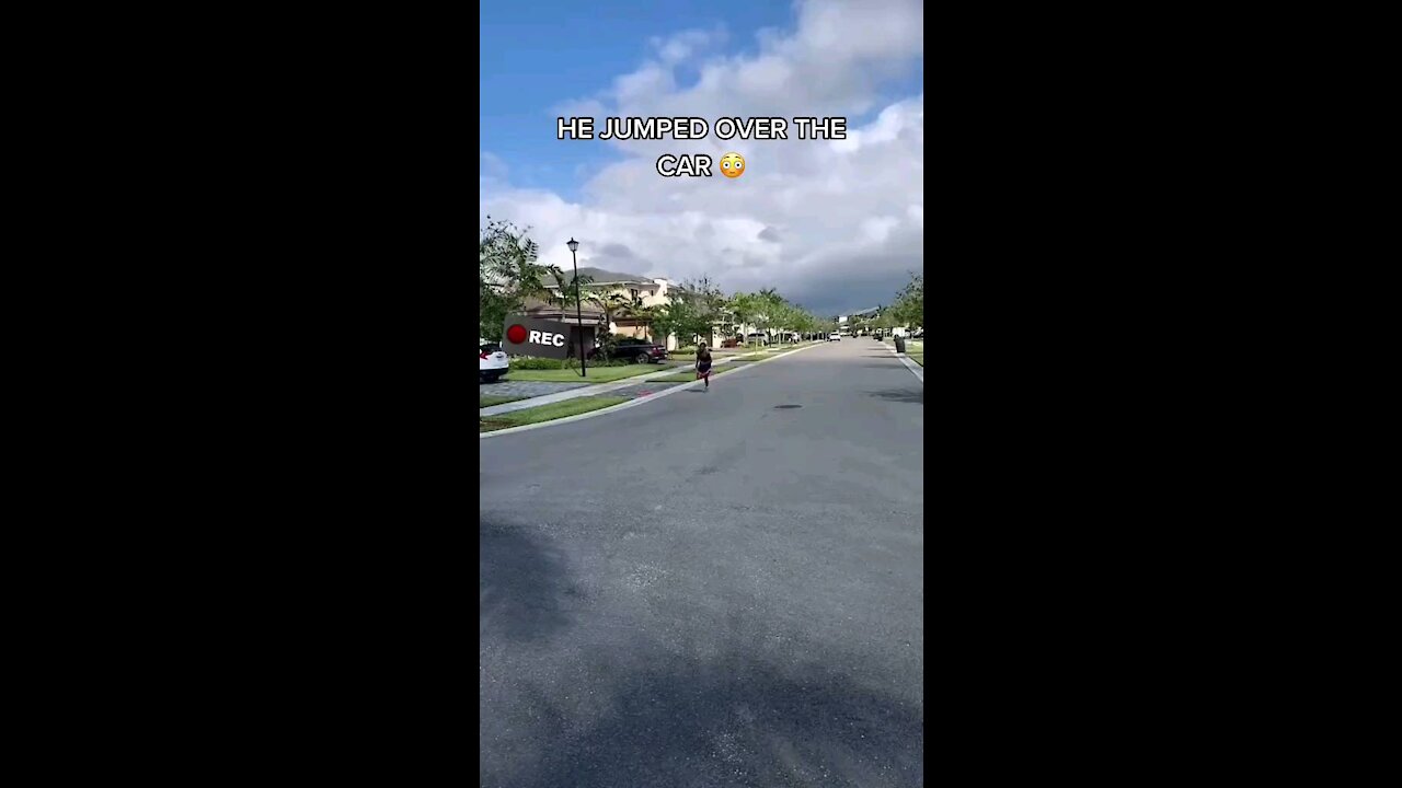 Kid jumping over car