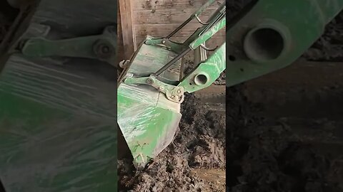 The only way to clean a pig pen. John Deere 3038