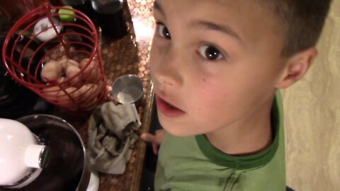 Texas boys make Brownie Cake