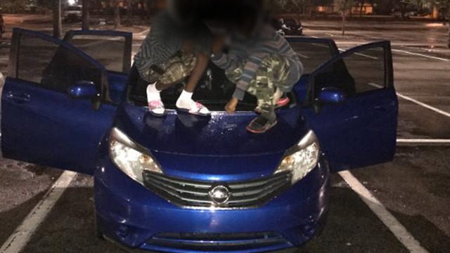 Sheriff: Teens pose on stolen car, arrested after running from deputies