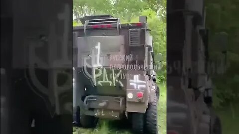 Partisans From Russian Liberation Showing Equipment They Bought At A Local Store To Fight Putin