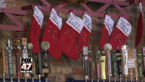 Santas needed to have fun while giving back during SantaCon on Monday