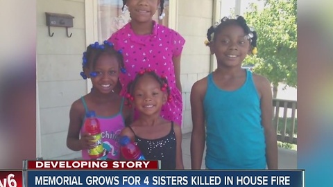 Memorial grows for four sisters killed in house fire