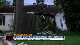 Truck drives into St. Petersburg home, seriously injuring woman inside