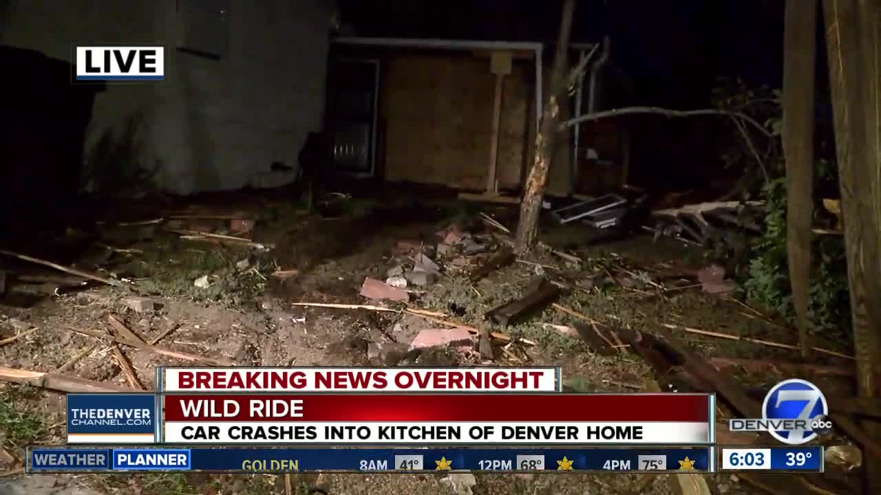 Car crashes through 2 fences, into home in Denver