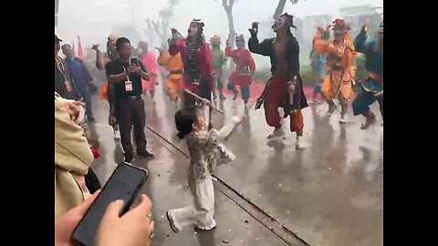 Check out this spirited 5 y.o. girl local Yingge dance team at a parade in Shantou, Guangdong, China