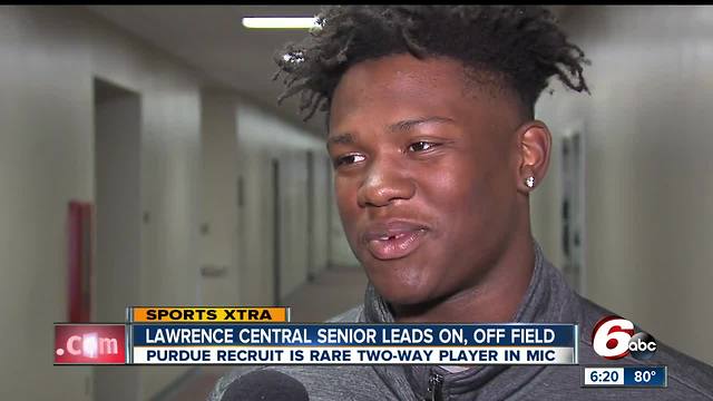Lawrence Central High School senior leads on the field, among peers