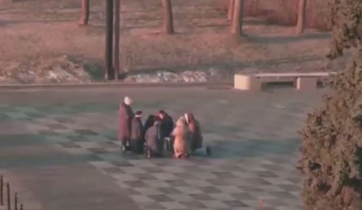WATCH: Ukrainians Kneel in Prayer